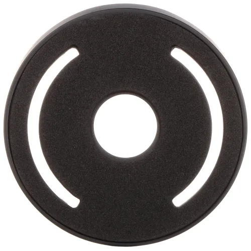 Czarny, okrągły element z centralnym otworem i dwoma symetrycznymi, podłużnymi wycięciami po bokach. Powierzchnia wydaje się być wykonana z materiału o teksturze przypominającej piankę.