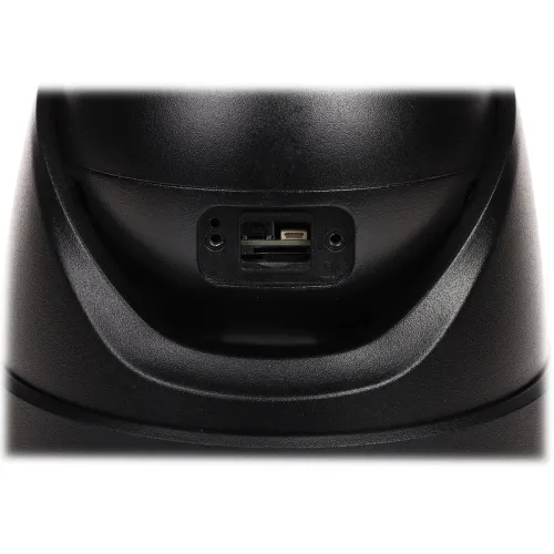 Czarny panel z gniazdem na kartę pamięci i przyciskiem reset umieszczony na zakrzywionej powierzchni. Gniazdo znajduje się w centralnej części panelu, otoczone gładkim, matowym tworzywem.