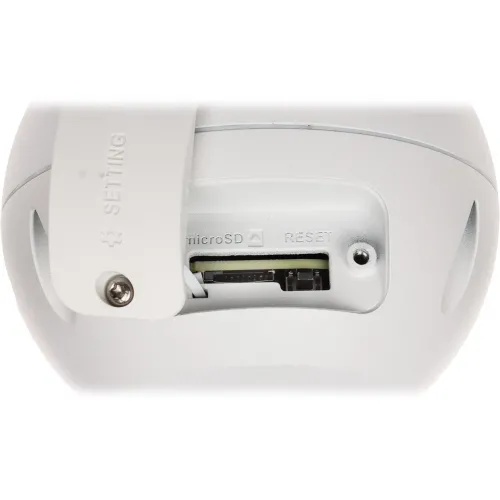 Zdjęcie przedstawia zbliżenie na gniazdo karty microSD oraz przycisk reset na białym urządzeniu. Obok znajduje się śruba z napisem "SETTING".