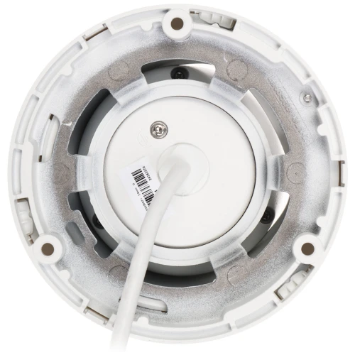 Zdjęcie przedstawia tylną część kamery IP z widocznym okrągłym mocowaniem i przewodem zasilającym. Kamera ma metaliczną obudowę z kilkoma otworami montażowymi.