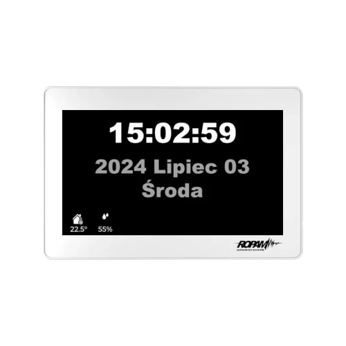 Na zdjęciu widoczny jest biały manipulator dotykowy marki Ropam z wyświetlaczem pokazującym godzinę 15:02:59 oraz datę 3 lipca 2024, środa. W lewym dolnym rogu ekranu znajdują się ikony temperatury 22.5°C i wilgotności 55%.