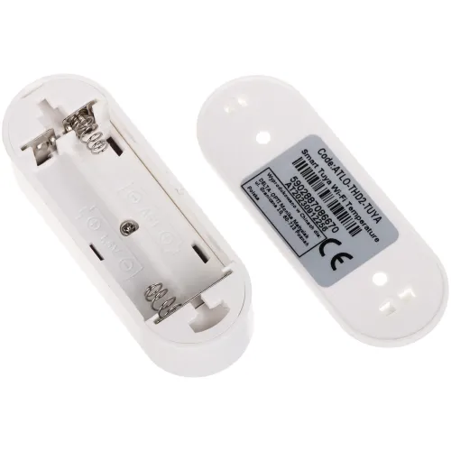 Zdjęcie przedstawia biały pojemnik na baterie 2 x 1,5V AAA z widocznymi sprężynkami i oznaczeniami biegunów. Obok znajduje się pokrywa z naklejką zawierającą kod produktu i informacje techniczne.