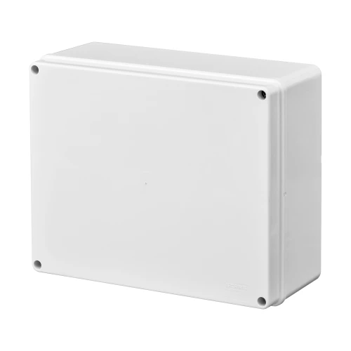 Prostokątna, biała obudowa zewnętrzna z zaokrąglonymi krawędziami i czterema widocznymi śrubami w rogach. Powierzchnia jest gładka, a materiał wygląda na trwały i odporny na warunki atmosferyczne.