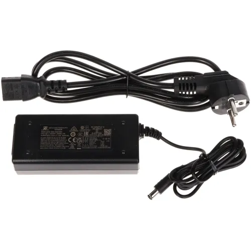 Zestaw składa się z czarnego zasilacza sieciowego oraz dwóch kabli: jednego z wtyczką do gniazdka elektrycznego i drugiego z końcówką do podłączenia urządzenia. Zasilacz ma widoczne oznaczenia techniczne na obudowie.