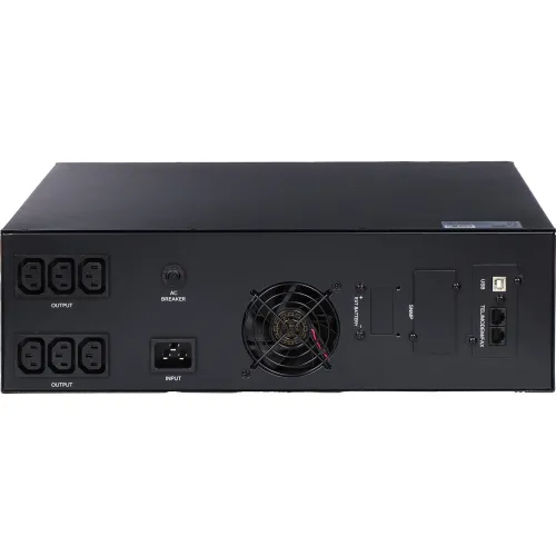 Na zdjęciu widoczny jest tył urządzenia elektronicznego z różnymi portami i złączami, w tym gniazdami zasilania, wentylatorem oraz portami USB i sieciowymi. Obudowa jest czarna, a elementy są rozmieszczone symetrycznie na powierzchni panelu.