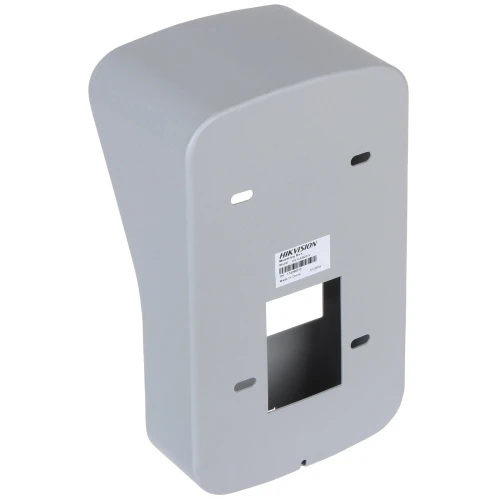 Metalowa obudowa montażowa w kolorze szarym, przeznaczona do instalacji kamer monitoringu. Posiada otwory montażowe oraz wycięcie na przewody.