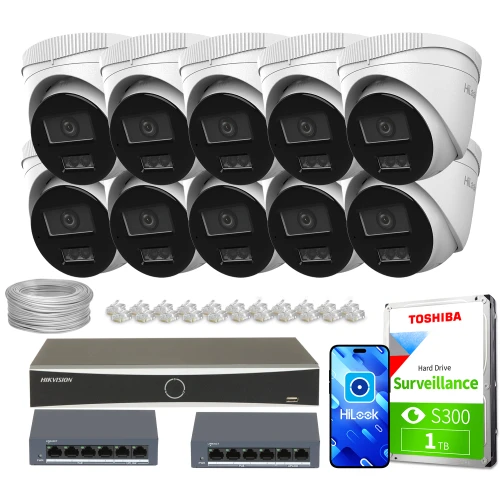 Zestaw do monitoringu składający się z dziesięciu kamer, rejestratora, dysku twardego, dwóch switchów oraz akcesoriów montażowych. Kamery są w kolorze białym z czarnymi elementami, a dysk twardy ma pojemność 1 TB.