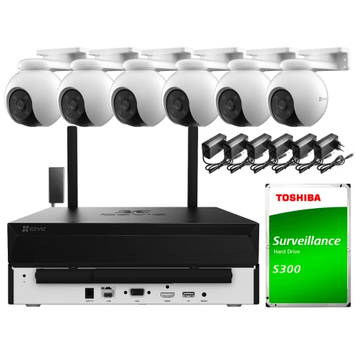Na zdjęciu znajduje się zestaw do monitoringu, składający się z sześciu kamer, rejestratora oraz dysku twardego Toshiba S300. Kamery są zamontowane na białych uchwytach, a rejestrator posiada różne porty z tyłu.